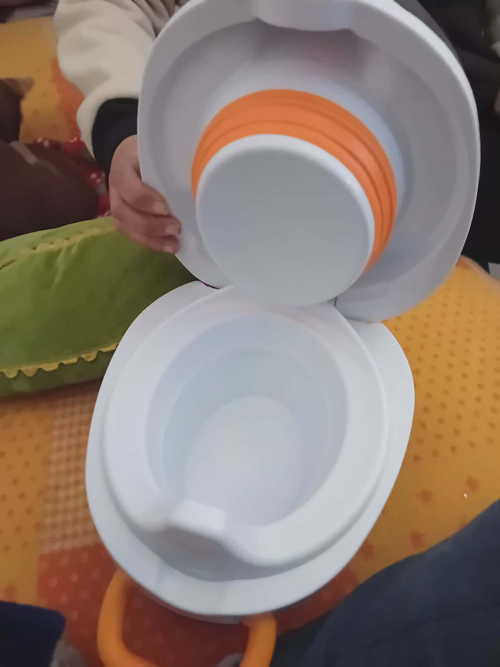 Foldable Potty Training Toilet – Child-Sized Travel-Friendly Design (White & Orange)
