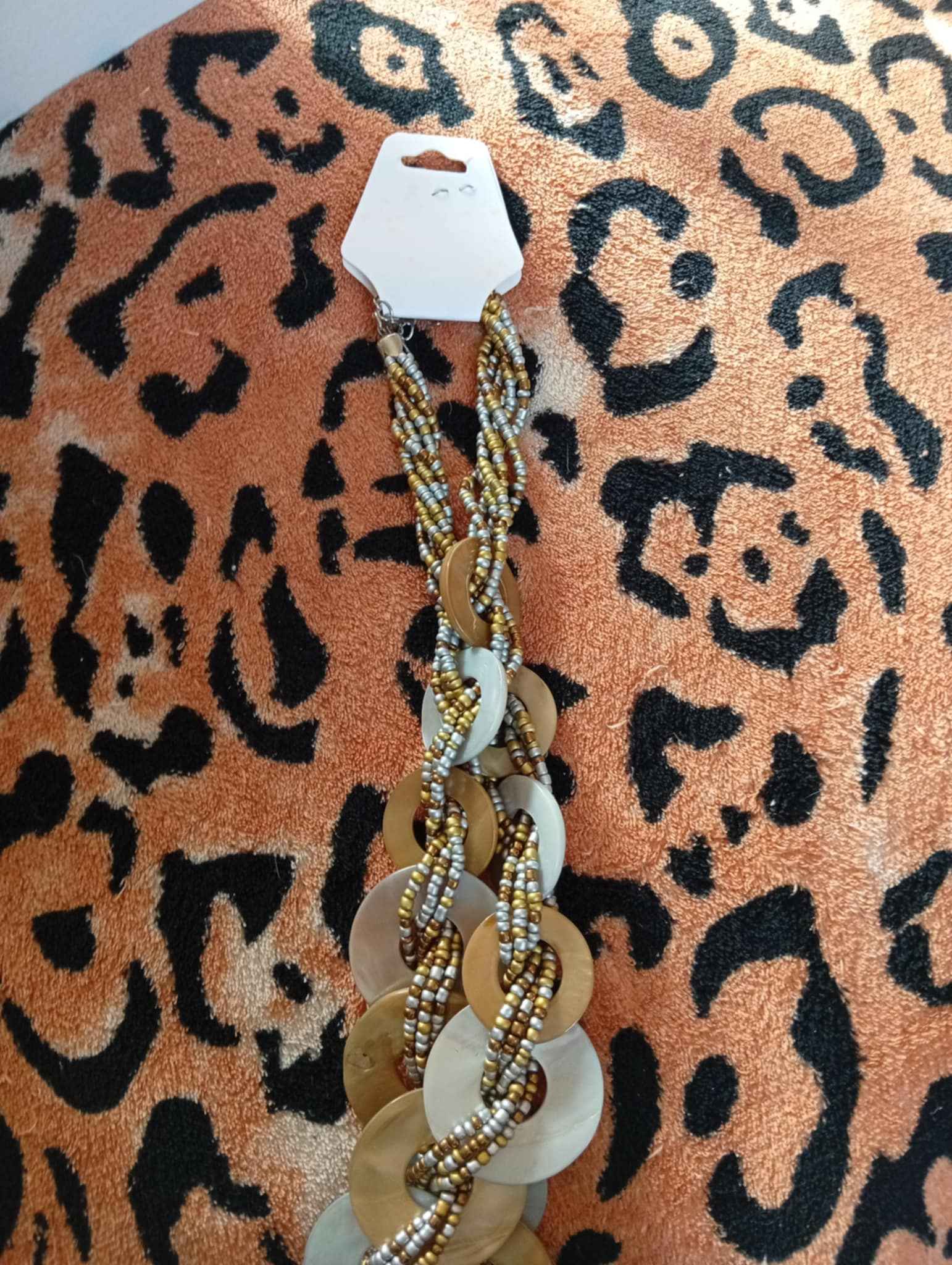 Layered Metallic Bead Necklace with Shell‑Style Discs