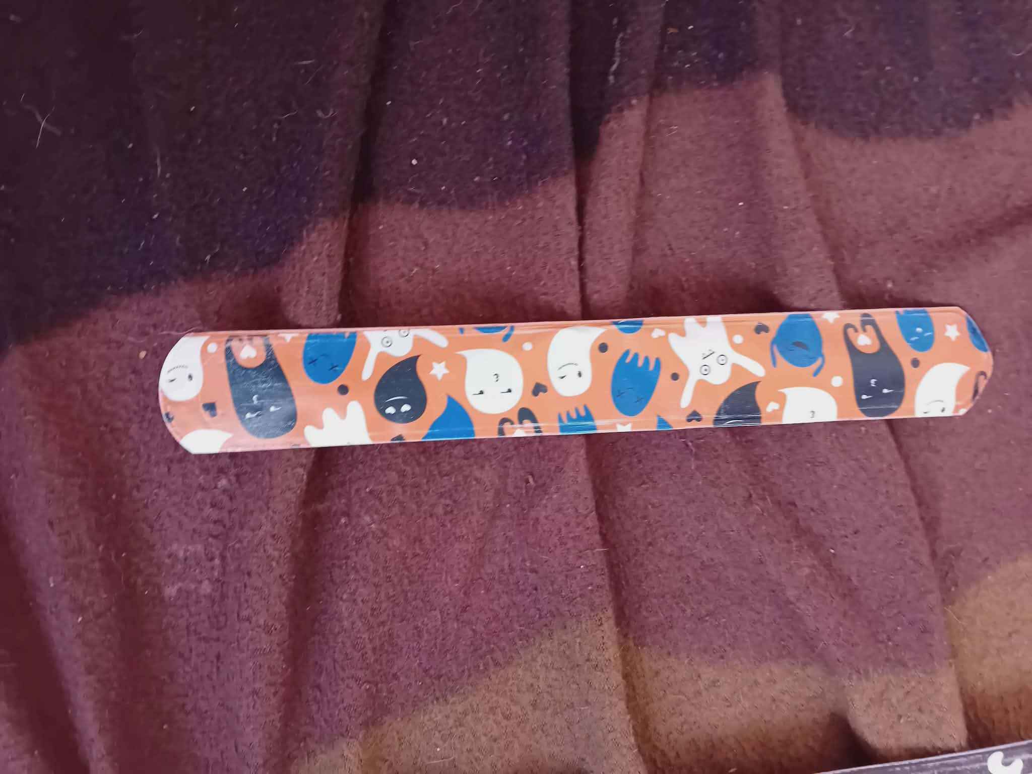 Whimsical Cartoon Snap Bracelet – Orange Pop Edition